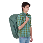 Man wearing Thule Roundtrip Bike Duffel 55L in hazy green color