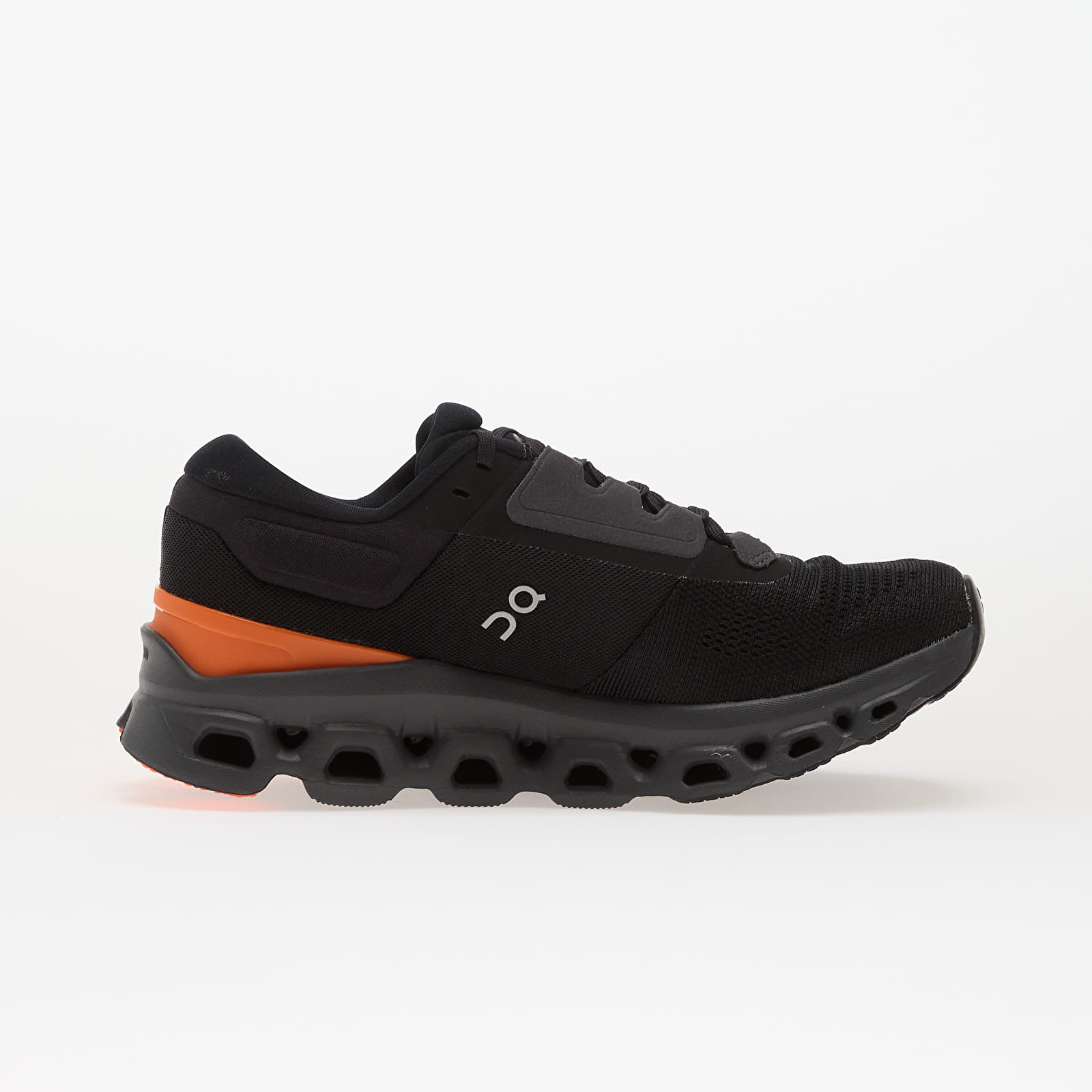 On Cloudstratus 3 women's running shoe in black with orange accent and CloudTec sole