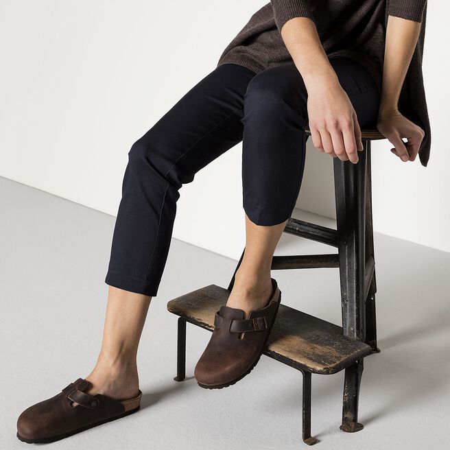Birkenstock Boston clogs in dark brown oiled leather worn by model