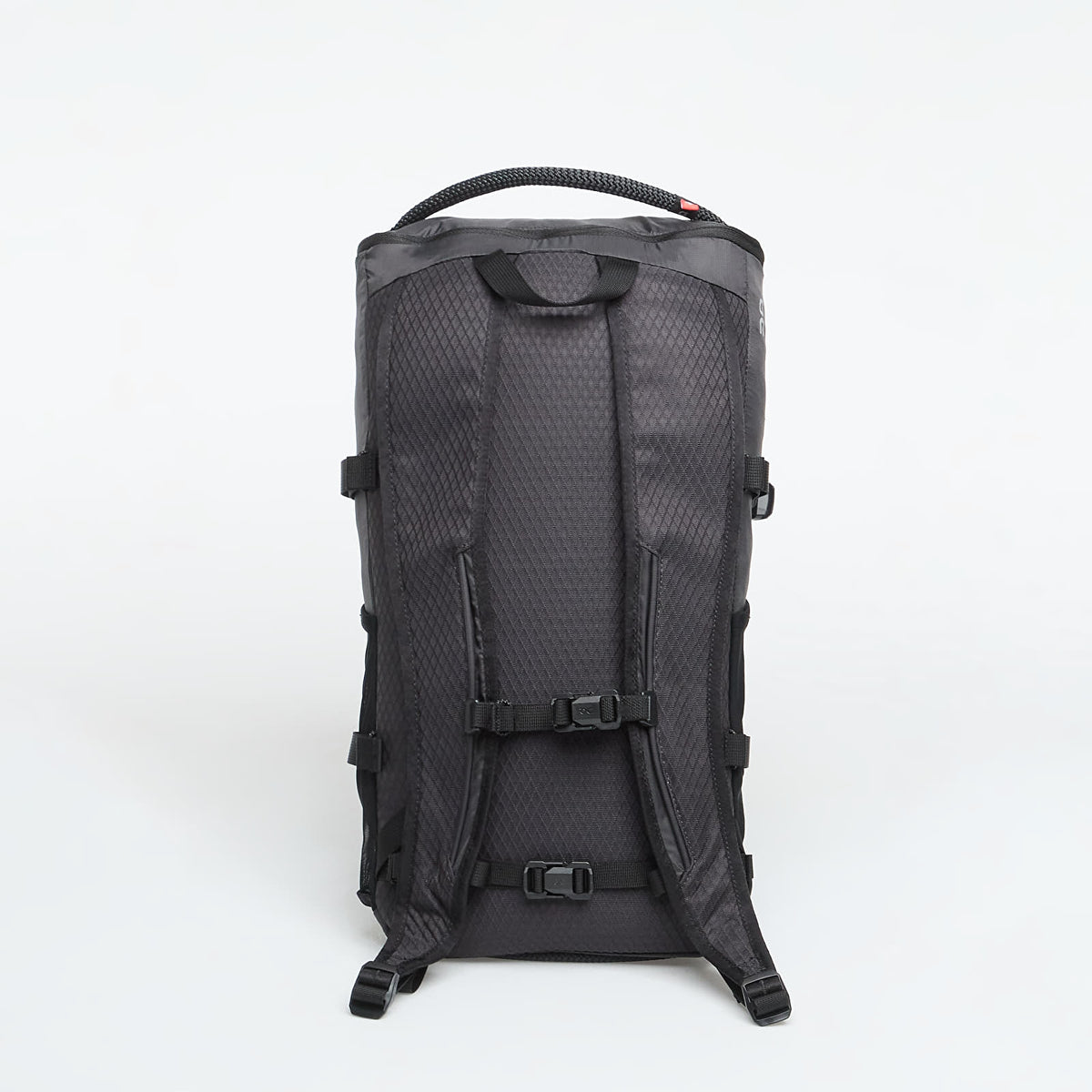 On Speed Pack 18L Lite backpack in Magnet black, rear view showing straps and buckles