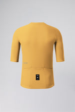 Back view of Gobik Phantom Jersey in golden yellow with rear pockets and logo