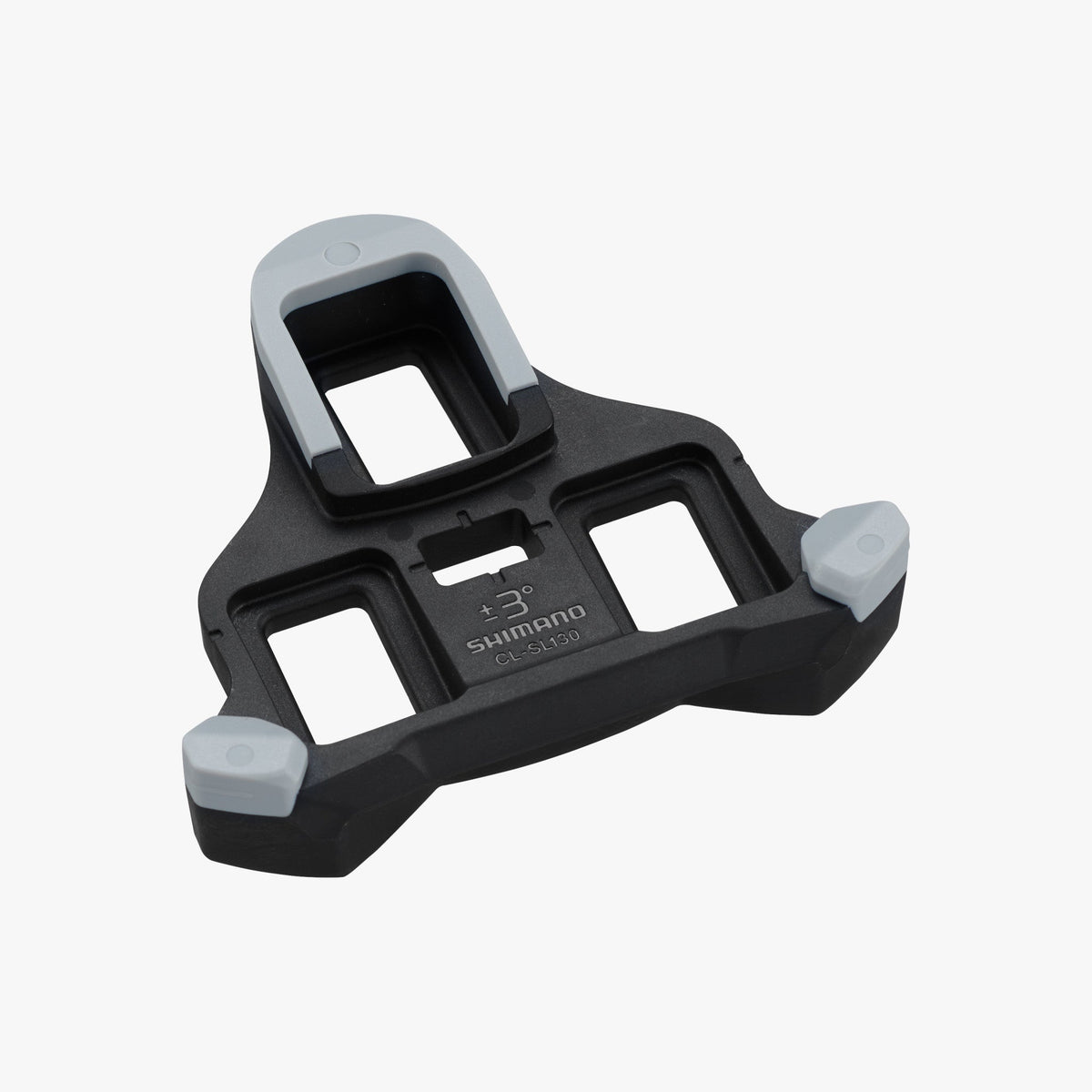 Shimano CL-SL130 SPD-SL road cycling cleat angled view showing bottom mounting surface and gray tips