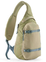 Patagonia Atom Sling 8L crossbody bag in weathered stone color with blue straps