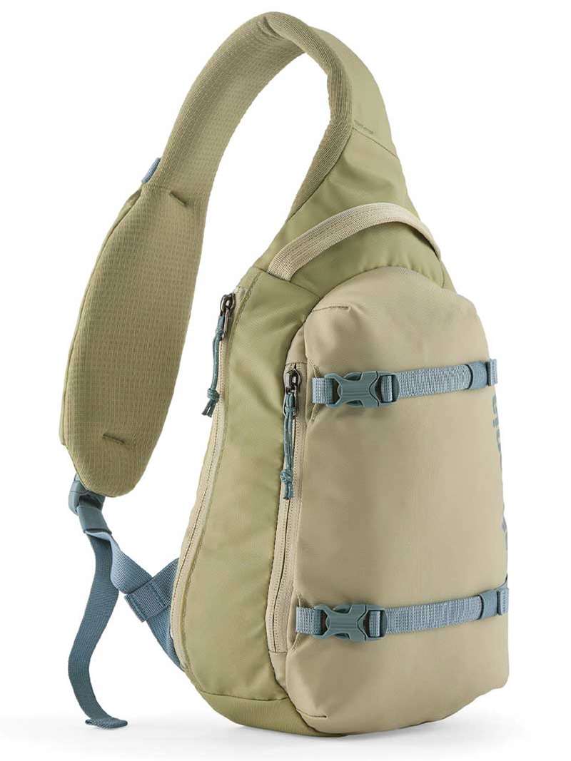 Patagonia Atom Sling 8L crossbody bag in weathered stone color with blue straps