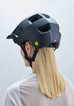 POC Kortal mountain bike helmet in matte black worn by blonde woman
