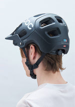 POC Tectal MTB Helmet in Uranium Black worn by model showing side profile and fit