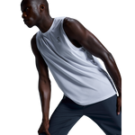 Man wearing On Core Tank in light heather gray running athletic wear