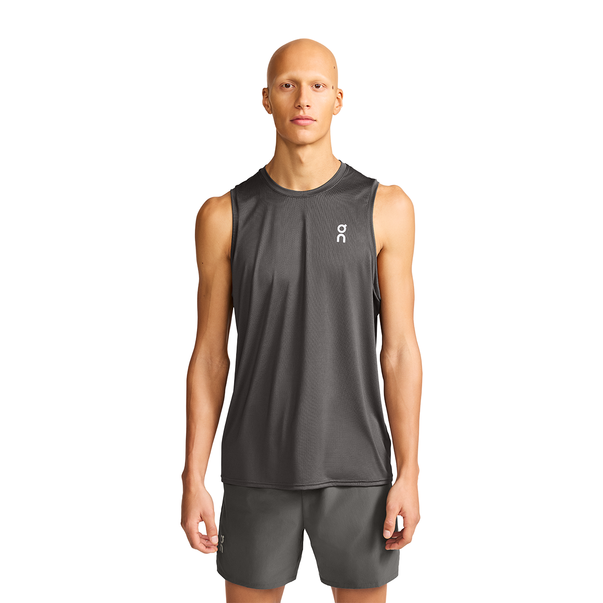Man wearing On Core Tank sleeveless running shirt in dark gray heather