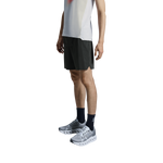 Man wearing black On 5-inch lightweight running shorts with athletic shoes