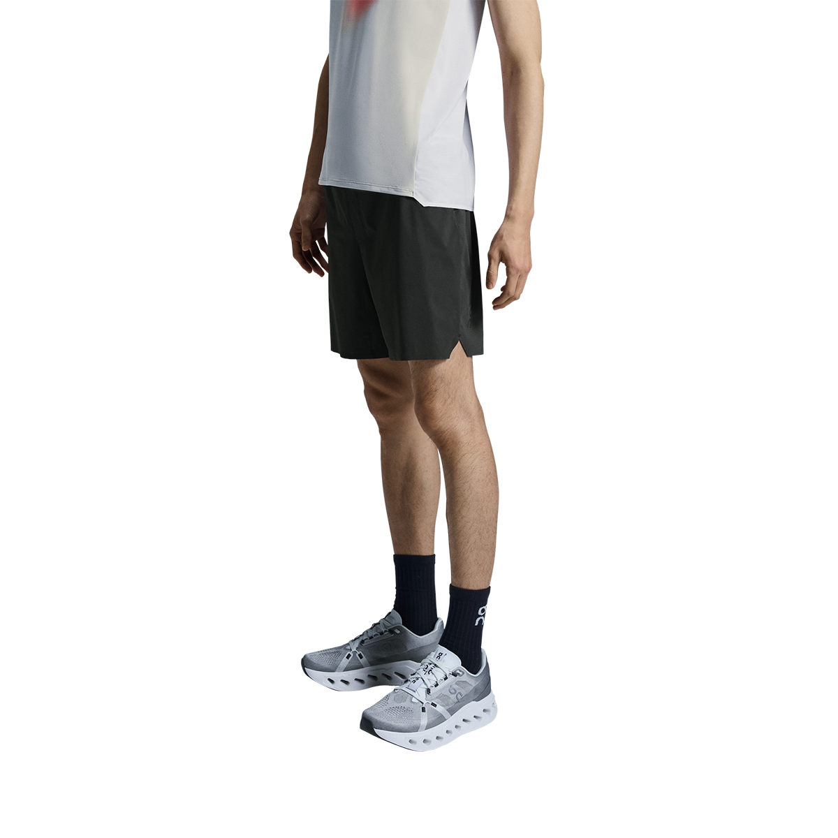 Man wearing black On 5-inch lightweight running shorts with athletic shoes