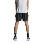 Man wearing On 5 inch lightweight running shorts in black with white tank top