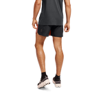 Man wearing black On 5-inch lightweight running shorts with orange accent detail