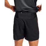 Man wearing black On 5-inch lightweight running shorts with zippered back pocket
