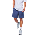 Man wearing navy blue On Focus athletic shorts with white t-shirt and sneakers