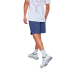 Man wearing On Focus Shorts in navy blue with white running shoes