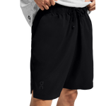 Man wearing black On Focus Shorts with drawstring waistband and On logo