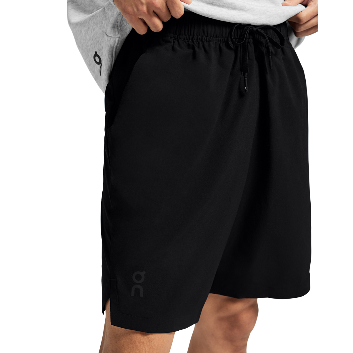 Man wearing black On Focus Shorts with drawstring waistband and On logo