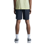 Man wearing navy blue On Focus Shorts from behind showing fit and length