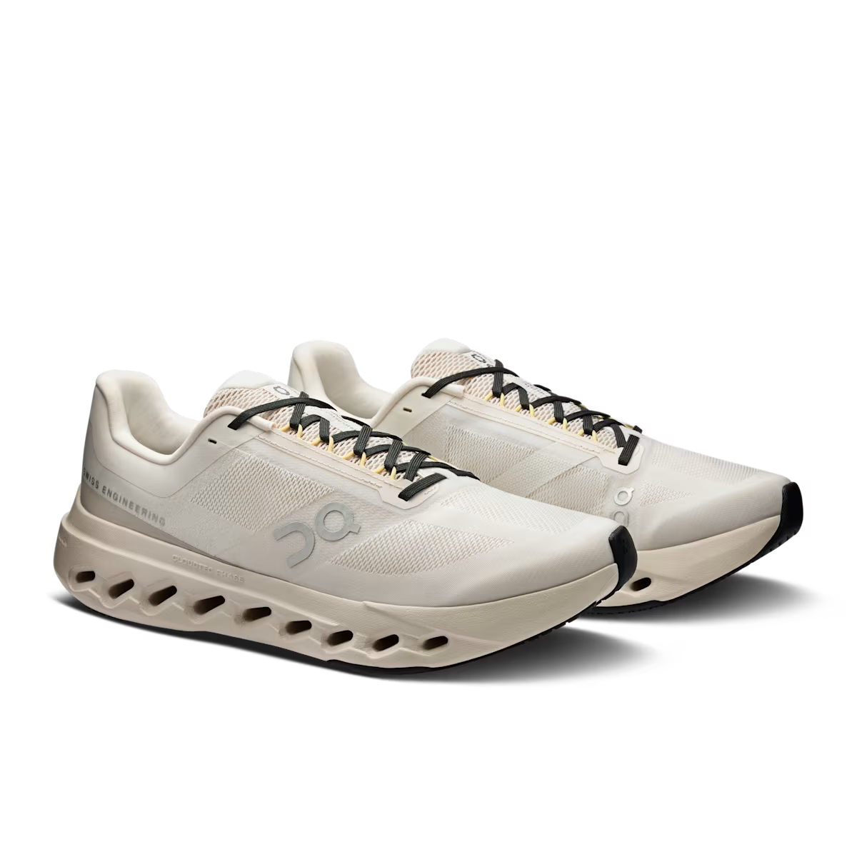 On Cloudsurfer Next men's running shoes in ivory colorway, three-quarter view showing pair