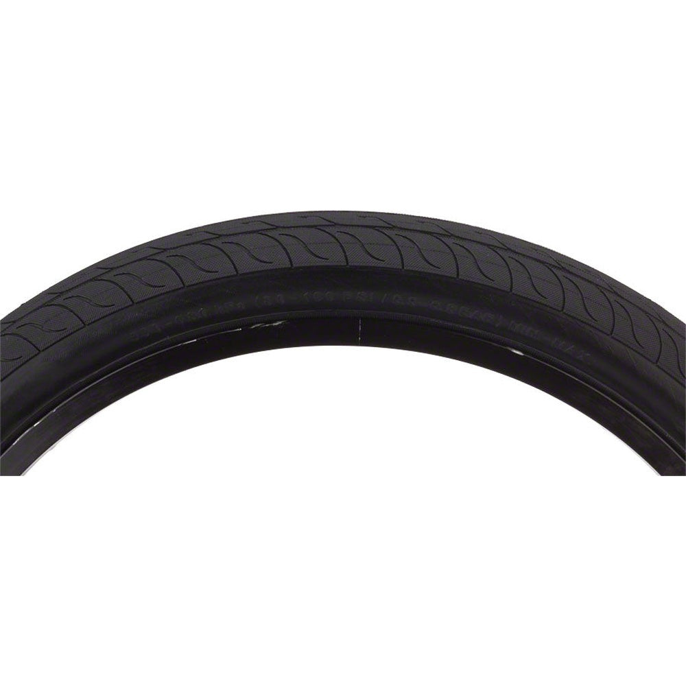 CST Decade BMX tire in all-black with subtle flame tread pattern