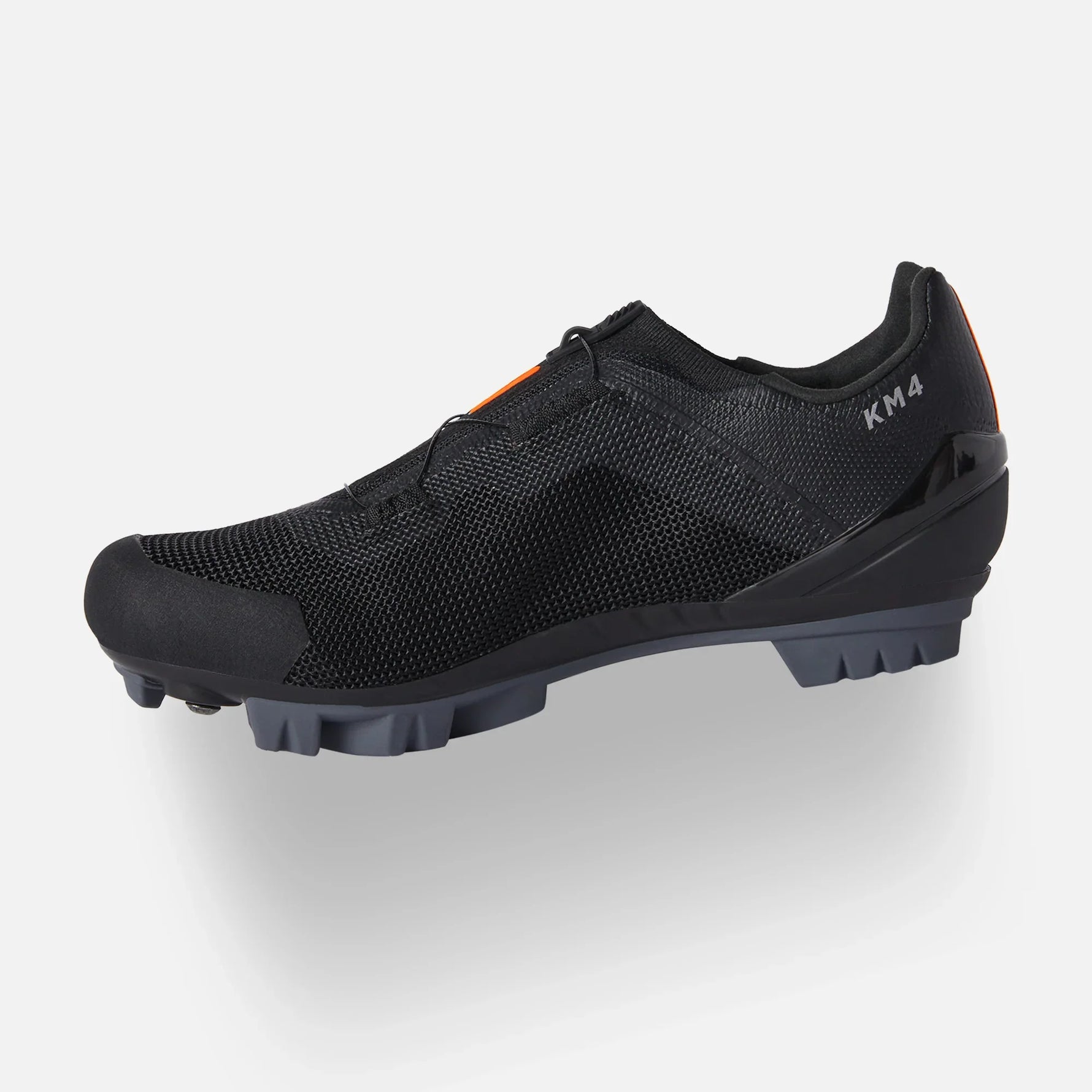 DMT KM4 MTB cycling shoes in black with red orange accents and BOA dial closure