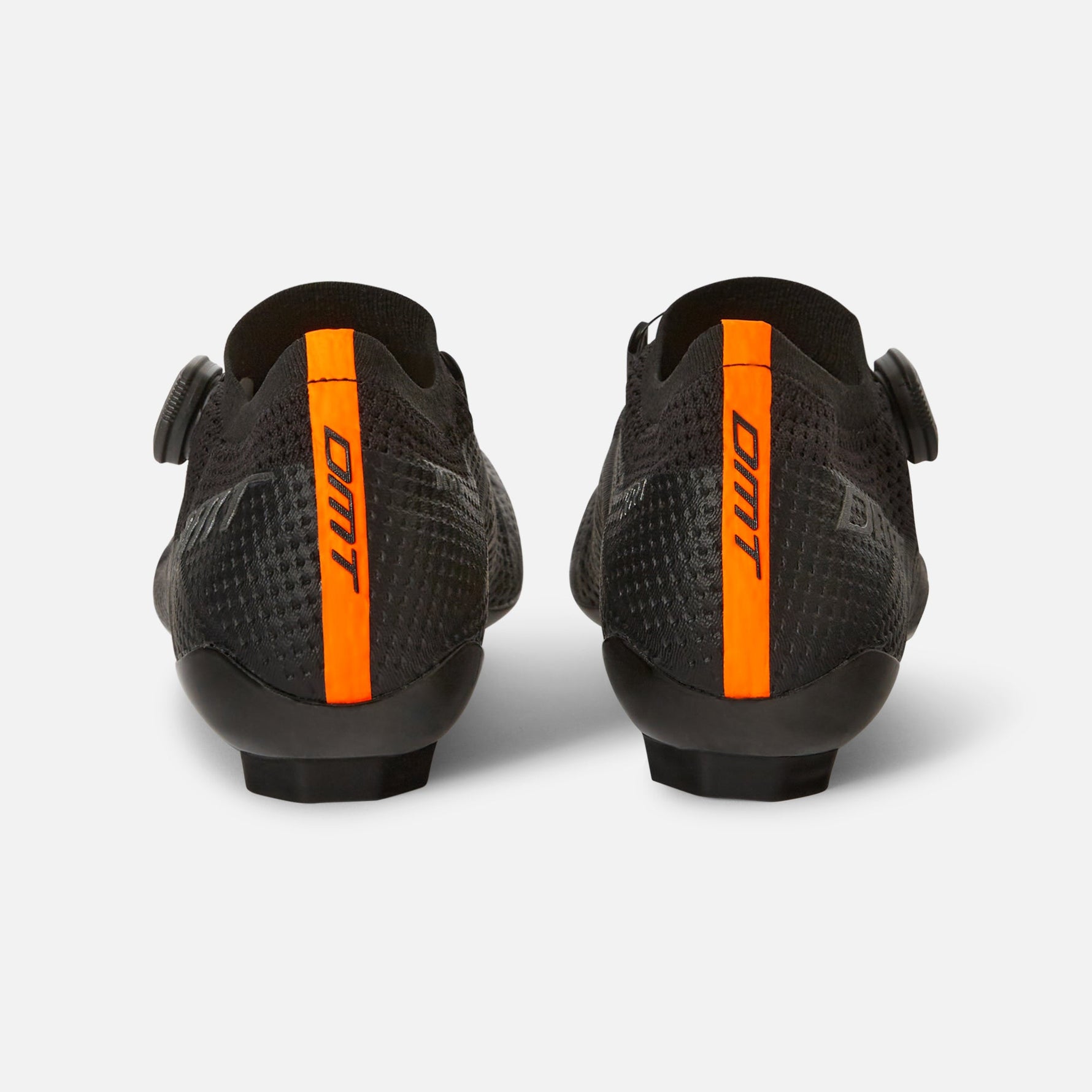 DMT KR1 road cycling shoes in black with orange heel tabs, rear view