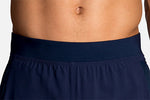 Brooks Sherpa 5-inch 2-in-1 men's running short in navy blue worn by male model