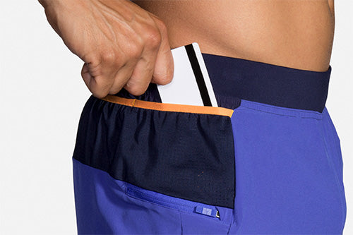 Brooks Sherpa 5-inch 2-in-1 men's running short with side pocket detail showing card storage