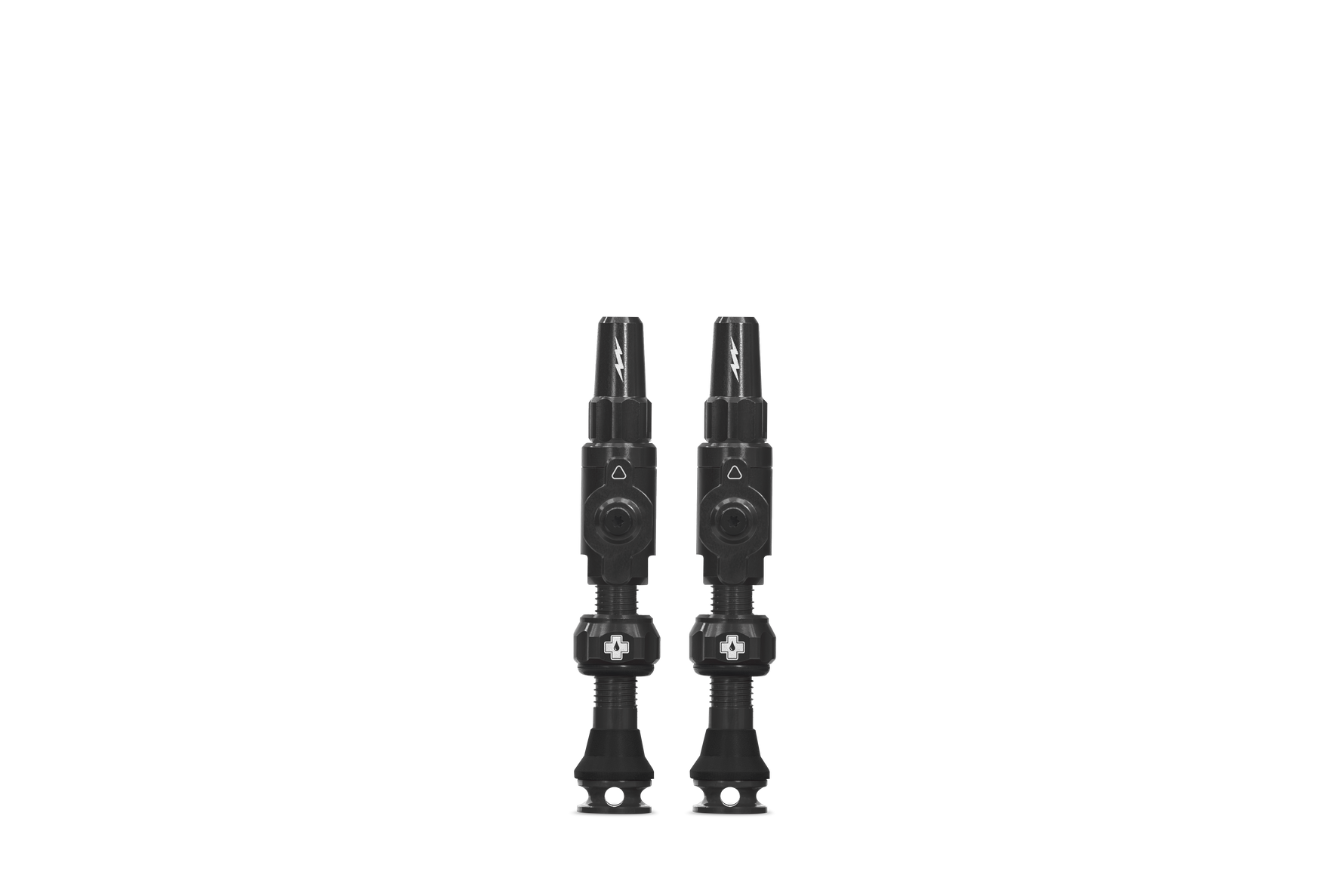 Two black Muc-Off Big Bore Lite tubeless Presta valves on white background