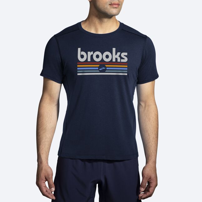Brooks Distance Short Sleeve 2.0 in HTR Navy with colorful track stripe graphic on male model