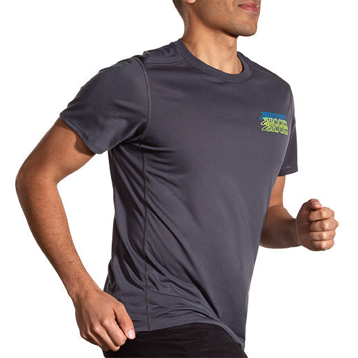 Man running in Brooks Distance Short Sleeve 3.0 charcoal gray performance shirt