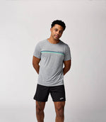 Man wearing Brooks Distance Short Sleeve 3.0 in heathered gray with chest stripe detail