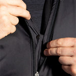 Close-up detail of Brooks Fusion Hybrid Jacket 2.0 black zipper and layering system