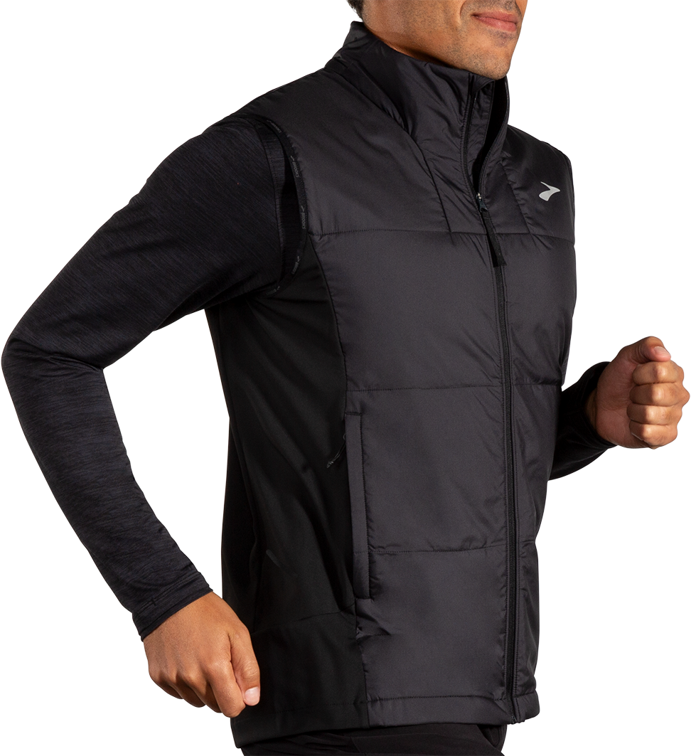 Brooks Shield Hybrid Vest 3.0 in black worn by male model running