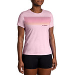 Brooks women's pink running t-shirt with colorful stripe design