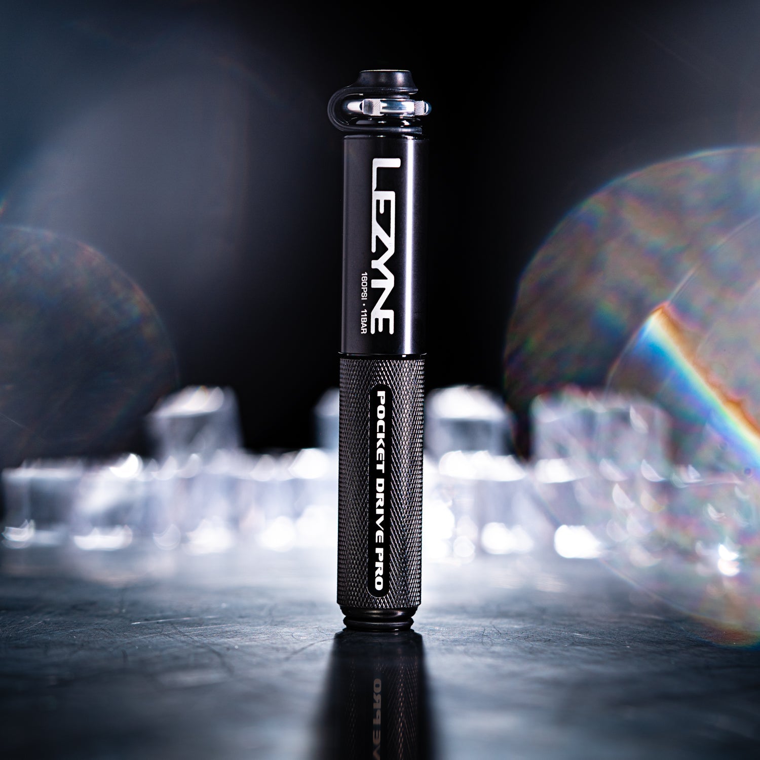 Lezyne Pocket Drive Pro bicycle pump in black metallic finish on reflective surface