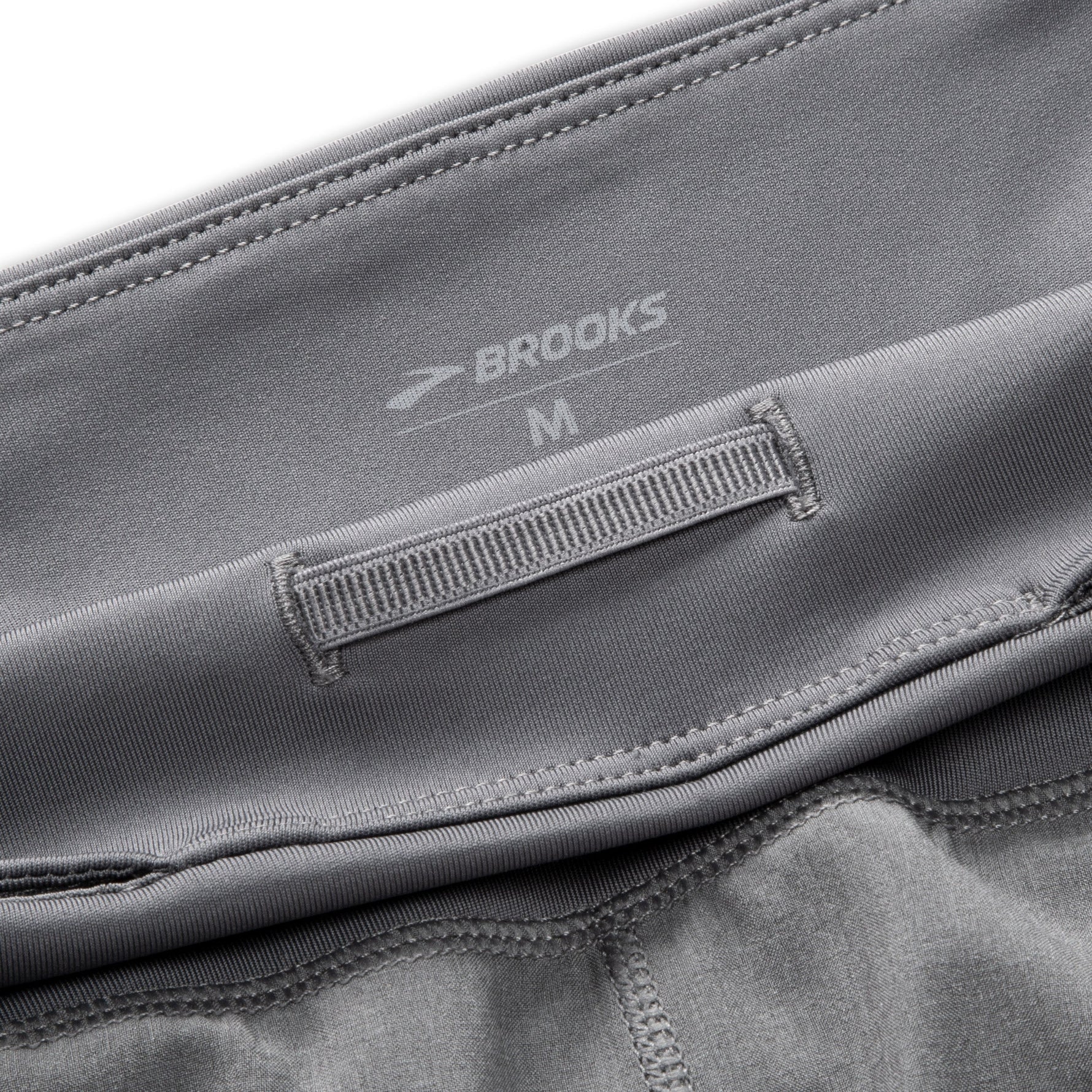 Brooks Chaser 7-inch Women's Short interior waistband detail in HTR Charcoal gray