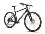 Eagle Bicycles Eagle 700 Hybrid black bike with tan sidewall tires, three-quarter front angle view