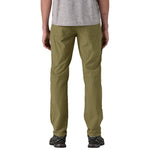 Patagonia men's Quandary pants in olive green on model from back view