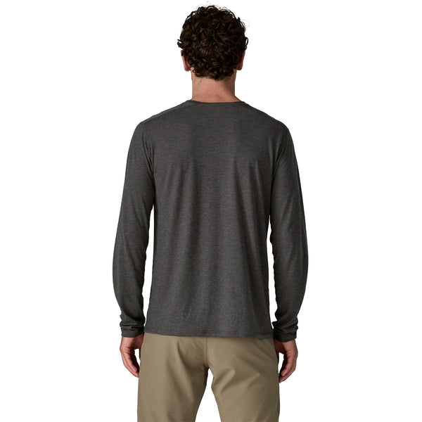 Male model wearing Patagonia Long-Sleeved Capilene Cool Trail Shirt in Ink Black, back view