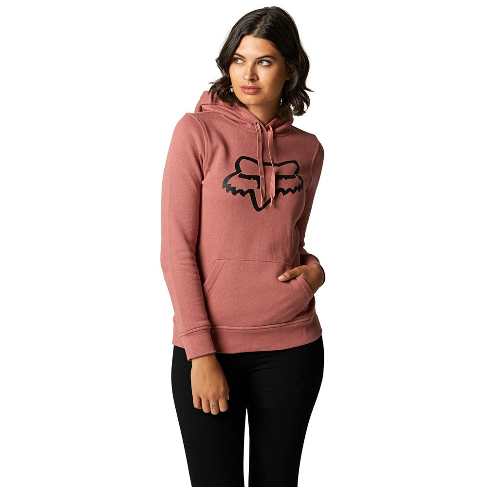 Woman wearing Fox Racing Boundary pullover hoodie in cranberry pink with fox logo