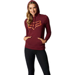 Woman wearing Fox Racing cranberry pullover hoodie with orange logo and black leggings