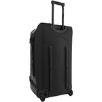 Patagonia Black Hole Wheeled Duffel 100L in black with extended handle and wheels