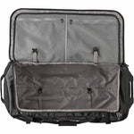 Open Patagonia Black Hole Wheeled Duffel showing interior compartments and organization straps