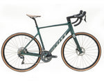 Scott Addict 20 Road Bike 2022 in teal green with drop handlebars and disc brakes