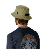 Person wearing Patagonia Surf Brimmer Hat in olive green, viewed from behind