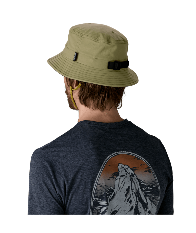Person wearing Patagonia Surf Brimmer Hat in olive green, viewed from behind