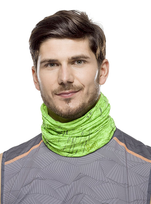 Man wearing bright green Buff Cool Net UV+ neck gaiter with geometric pattern
