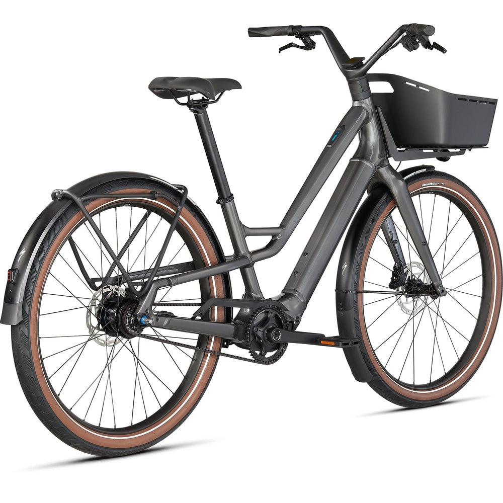 Specialized Turbo Como SL 5.0 electric bike in brushed silver with front basket