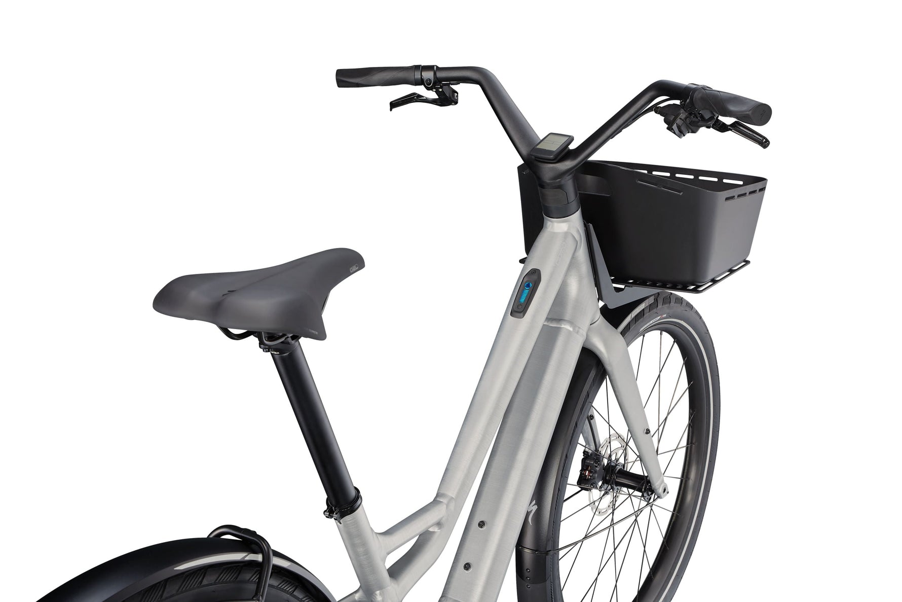Specialized Turbo Como SL electric bike in brushed silver with front basket